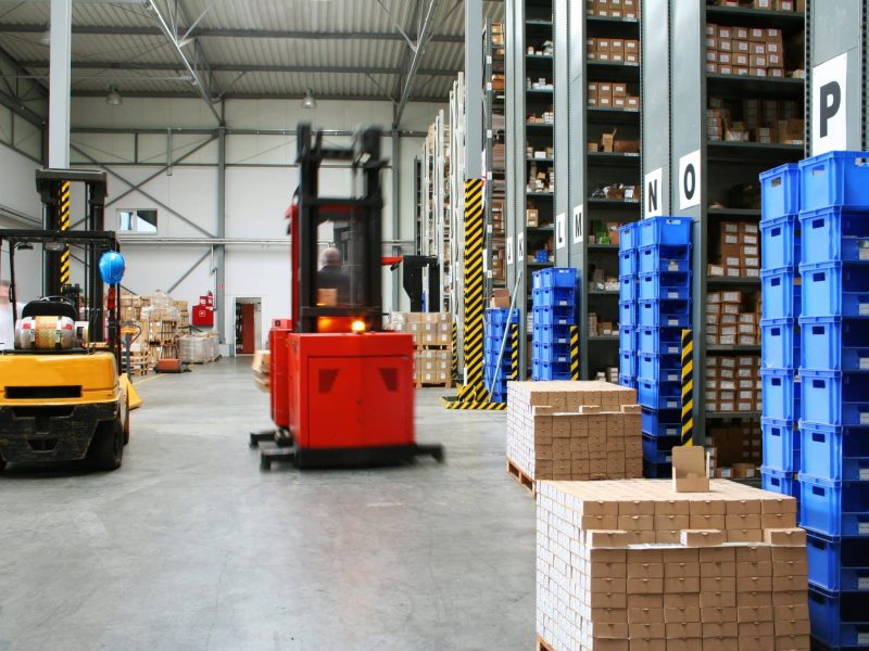 Warehouse,With,Pallet,Trucks,Working